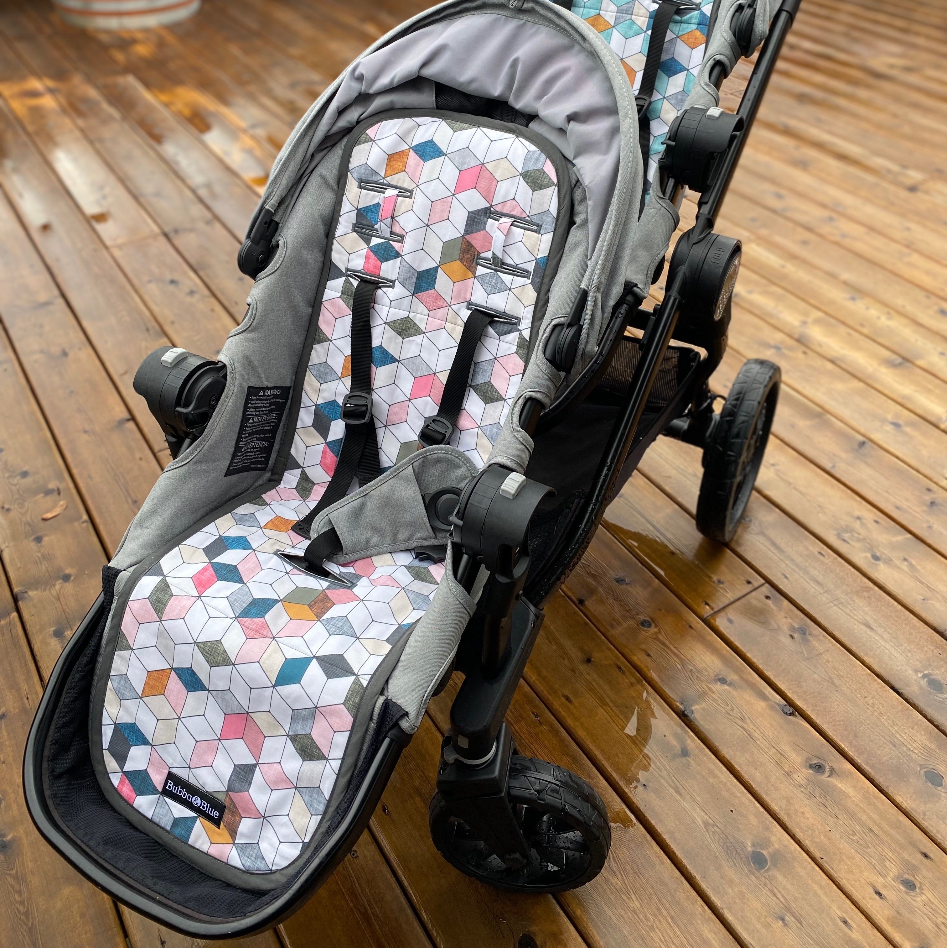 Stroller liner and foormuff set made to fit most strollers. Get a custom fit for a wide variety of strollers. These save your seat from wear and tear. This one is featured in the pink hex print.