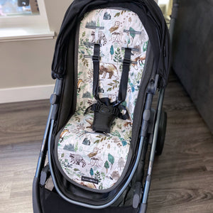 Stroller liner and foormuff set made to fit most strollers. Get a custom fit for a wide variety of strollers. These save your seat from wear and tear. This one is featured in the fable forest print.